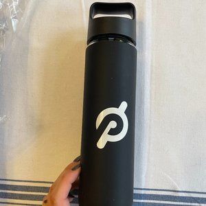 NWT Peloton glass water bottle with black silicone sleeve 16oz